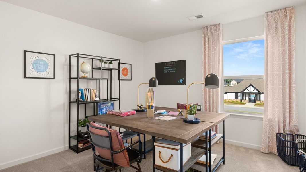 Furnished interior in a model home at Independence in Loganville (Image 31).