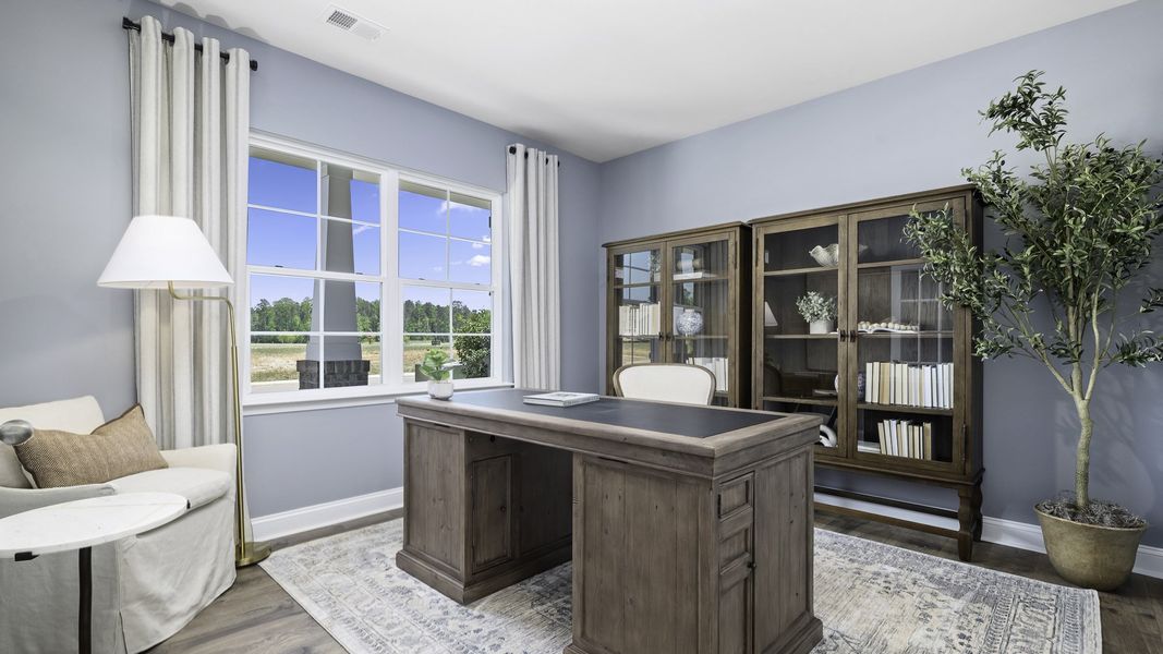 Furnished interior in a model home at The Preserve at Kinsley in Jamestown (Image 2).