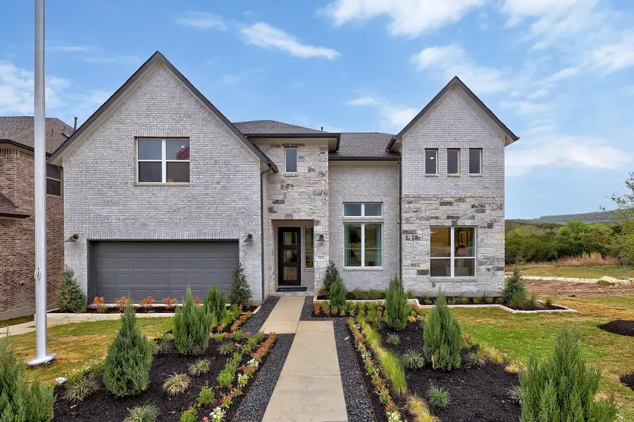 Front exterior of a home in the Lakeside at Tessera - 60' community, located in Lago Vista, TX (Image 1). Front exterior of a home in the Lakeside at Tessera - 60' community, located in Lago Vista, TX (Image 1).