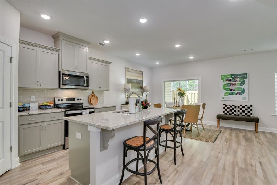 Furnished interior in a model home at Forrest Bluff in North Augusta (Image 4).
