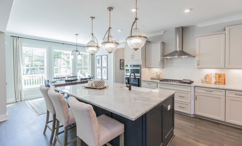 Furnished interior in a model home at Peyton's Creek in Statesville (Image 18).