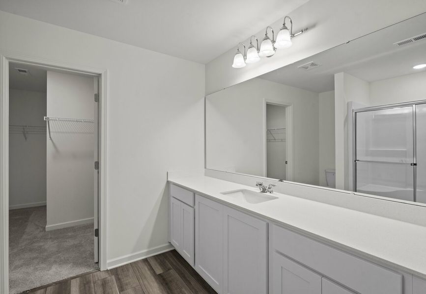 Furnished interior in a model home at Green Hill in Louisburg (Image 16).