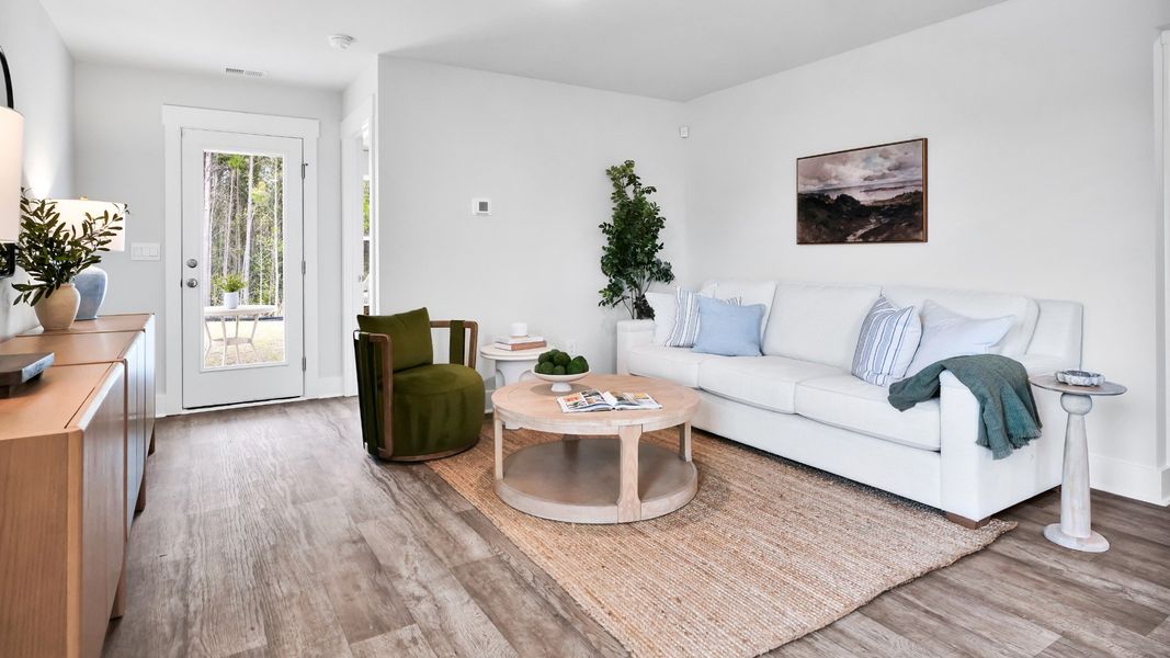 Furnished interior in a model home at Saltgrass Landing in Winnabow (Image 8).