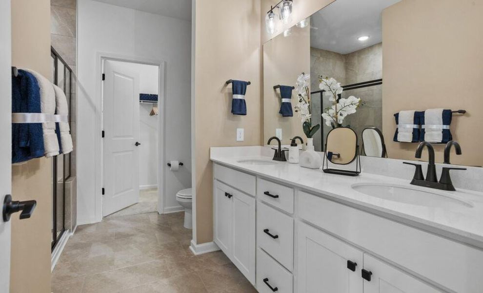 Furnished interior in a model home at CraigStone in Woodruff (Image 9).