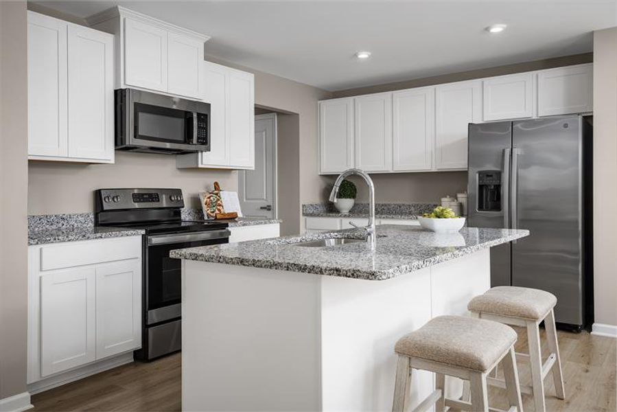 Furnished interior in a model home at Stanford Village in Lyman (Image 4).