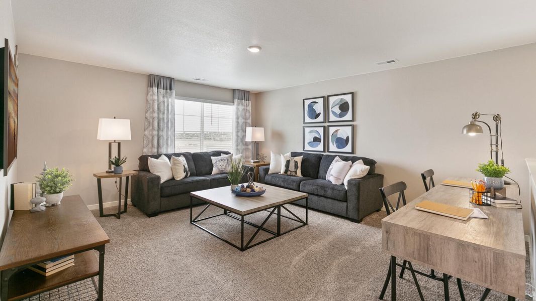 Furnished interior in a model home at Northridge Estates in Greeley (Image 17).