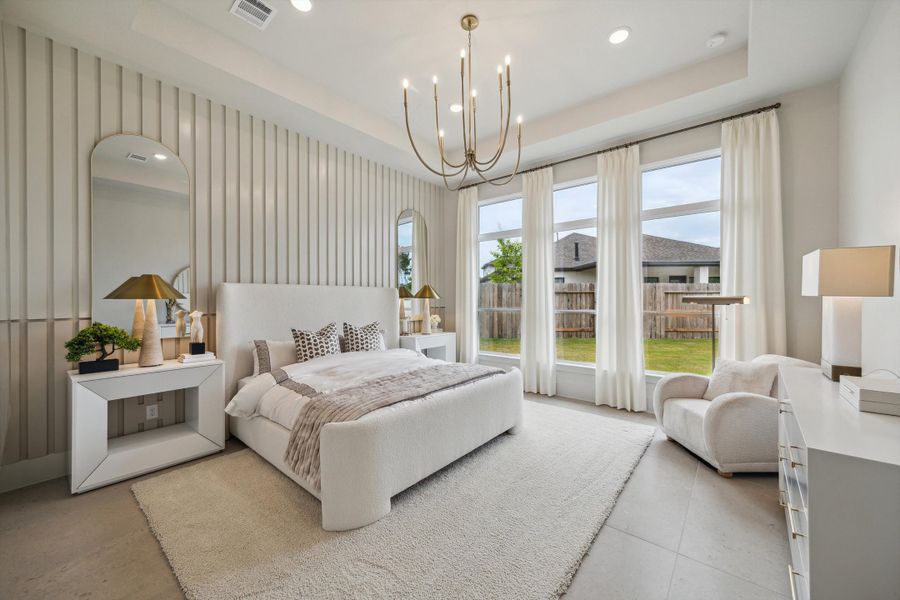 Furnished interior in a model home at ARTAVIA® - 65' Art in Conroe (Image 17).