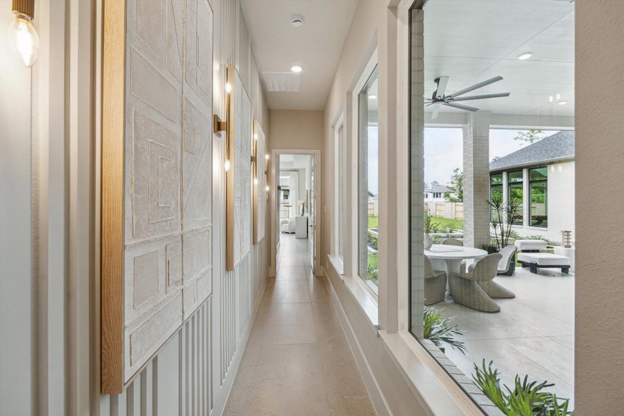 Furnished interior in a model home at ARTAVIA® - 65' Art in Conroe (Image 24).