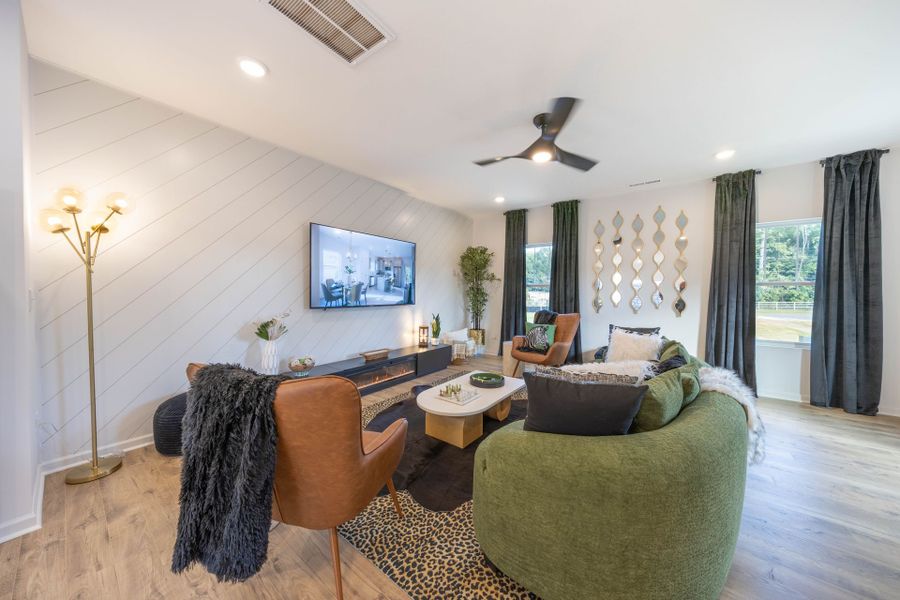 Furnished interior in a model home at Village at Reedy Creek Townhomes in Charlotte (Image 5). Furnished interior in a model home at Village at Reedy Creek Townhomes in Charlotte (Image 5).