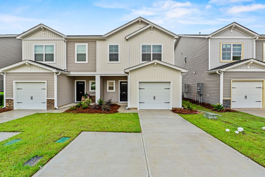Front exterior of a home in the Hunters Branch Townhomes community, located in Hopkins, SC (Image 2).