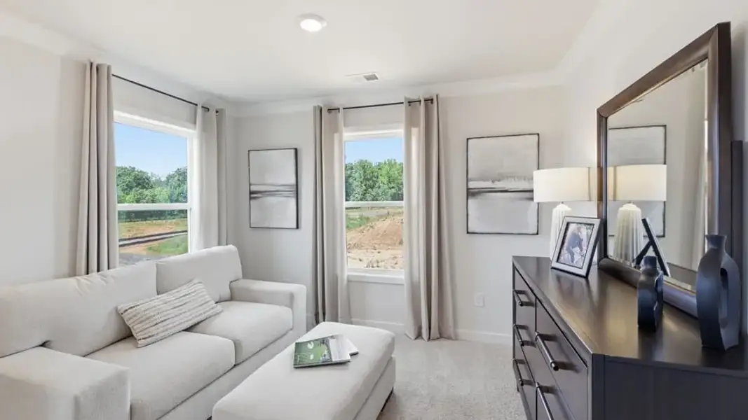 Furnished interior in a model home at Spring Ridge Reserve in Anderson (Image 37).