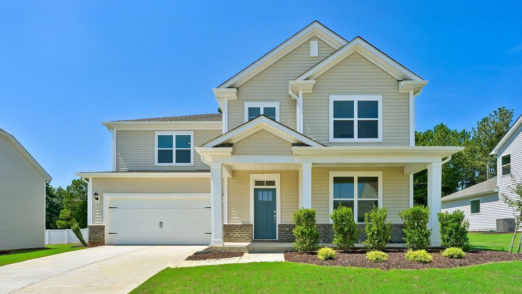 Front exterior of a home in the The Manors at Swift Creek Farm community, located in Clayton, NC (Image 3).