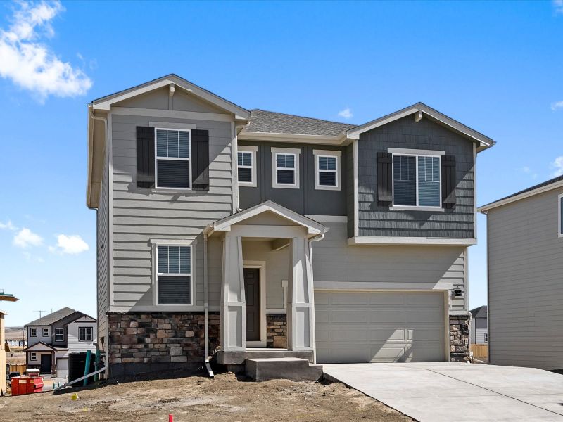 Front exterior of a home in the Frontier Estates - The Trails Collection community, located in Firestone, CO (Image 8).