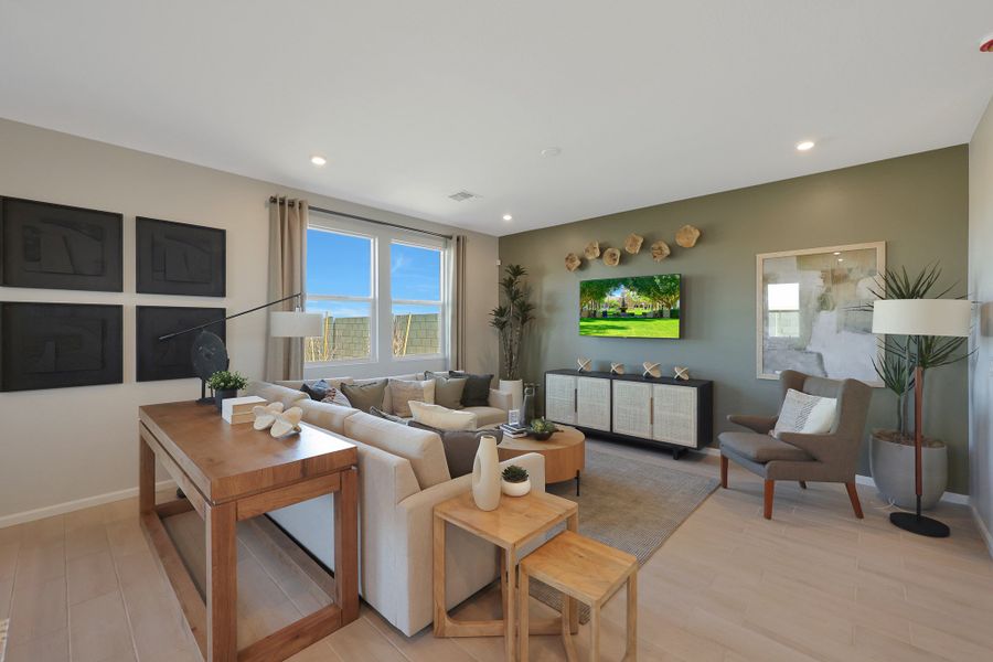 A living room with a large tv. A living room with a large tv.