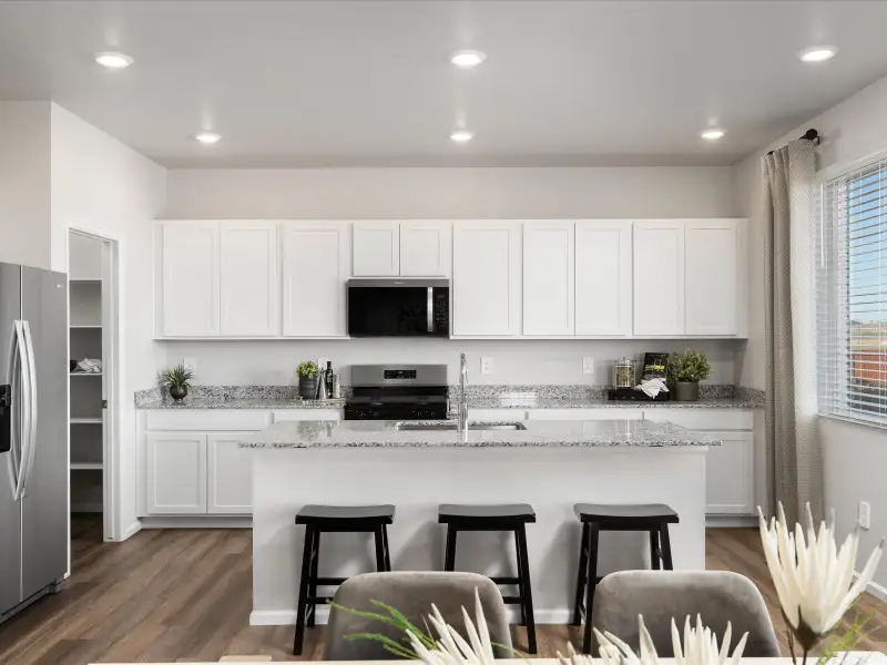 Furnished interior in a model home at Frontier Estates - The Flora Collection in Firestone (Image 3).