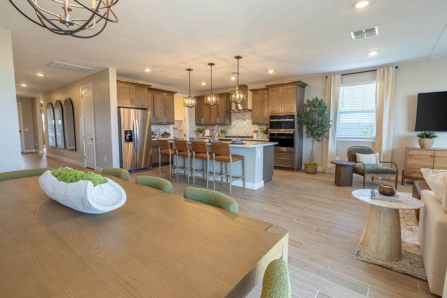Furnished interior in a model home at Blossom Rock Reserve Series in Apache Junction (Image 9).