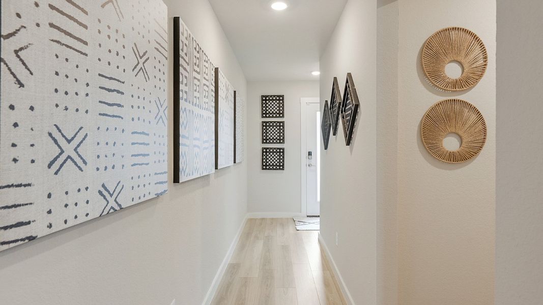 Furnished interior in a model home at Midtown Reserve in College Station (Image 10).