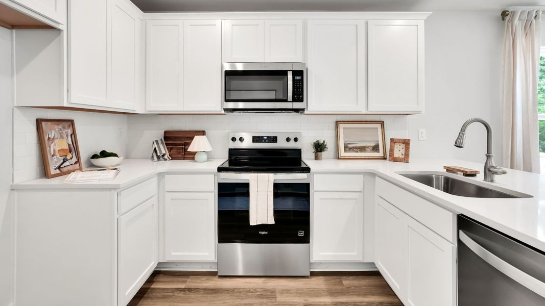 Furnished interior in a model home at The Willows at Blake Farm in Wilmington (Image 10). Furnished interior in a model home at The Willows at Blake Farm in Wilmington (Image 10).