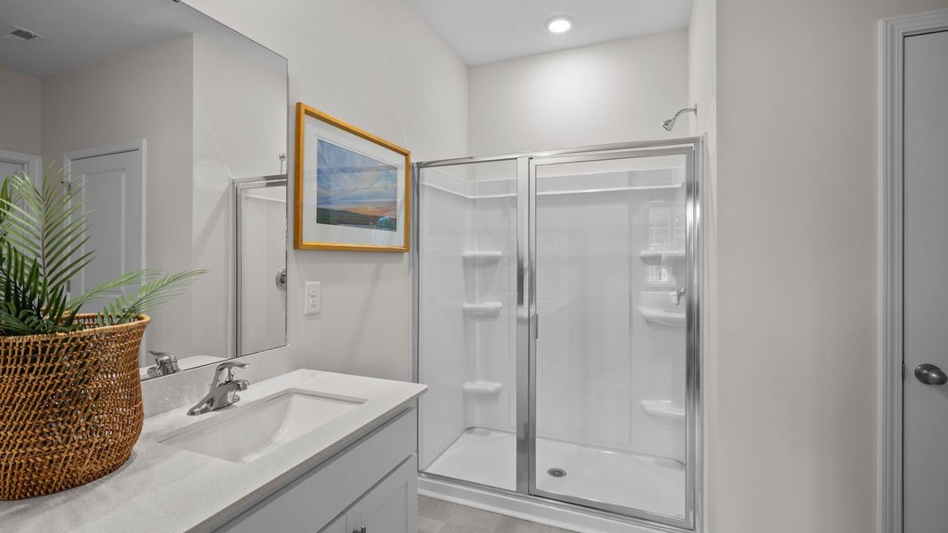 Furnished interior in a model home at Tyler - Home on the Lake in New Bern (Image 20).