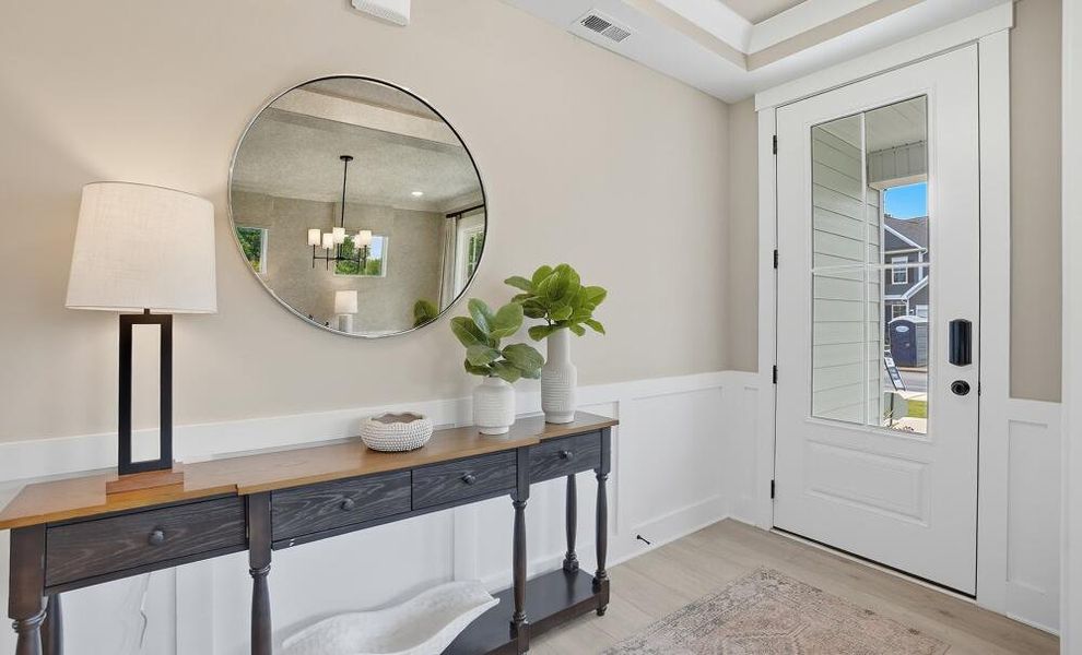 Furnished interior in a model home at Carrington in Stanley (Image 6).