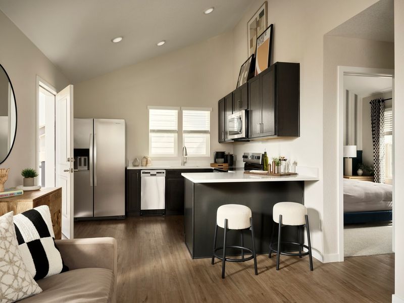 Furnished interior in a model home at Novella at Barefoot in Firestone (Image 6).