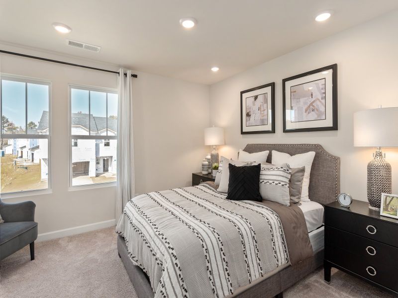 Two secondary bedrooms round out the upstairs.