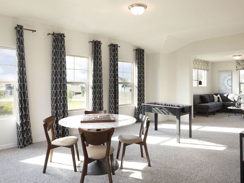 Enjoy entertaining in the upstairs game room