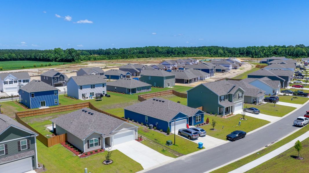 Aerial view of the Vineyard Trail community in Jacksonville, NC, showing layout and nearby surroundings (Image 14). Aerial view of the Vineyard Trail community in Jacksonville, NC, showing layout and nearby surroundings (Image 14).