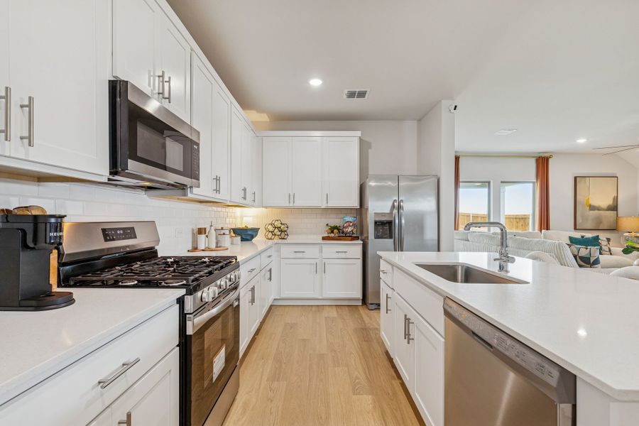 Kitchen in a Terra Vella Hayden Model Home in Fort Worth TX by Trophy Signature Homes