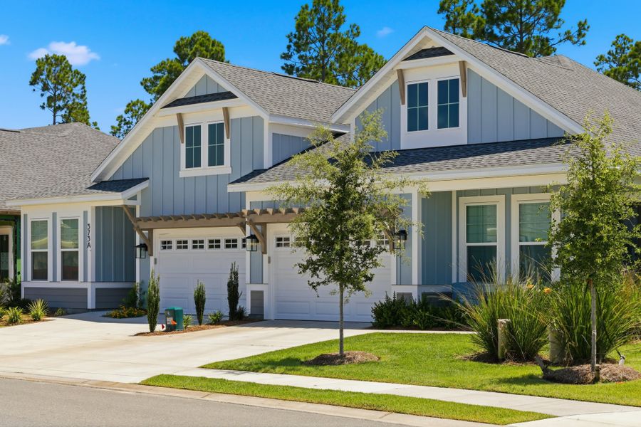 Front exterior of a home in the The Villas at Longleaf Park, a Watersound Origins® community community, located in Inlet Beach, FL (Image 5).