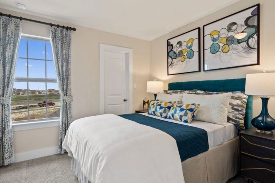 Furnished interior in a model home at Saddle Creek Twinhomes in Georgetown (Image 22).