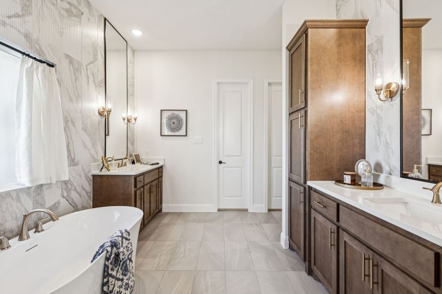 Furnished interior in a model home at Settler's Glen in New Fairview (Image 21).