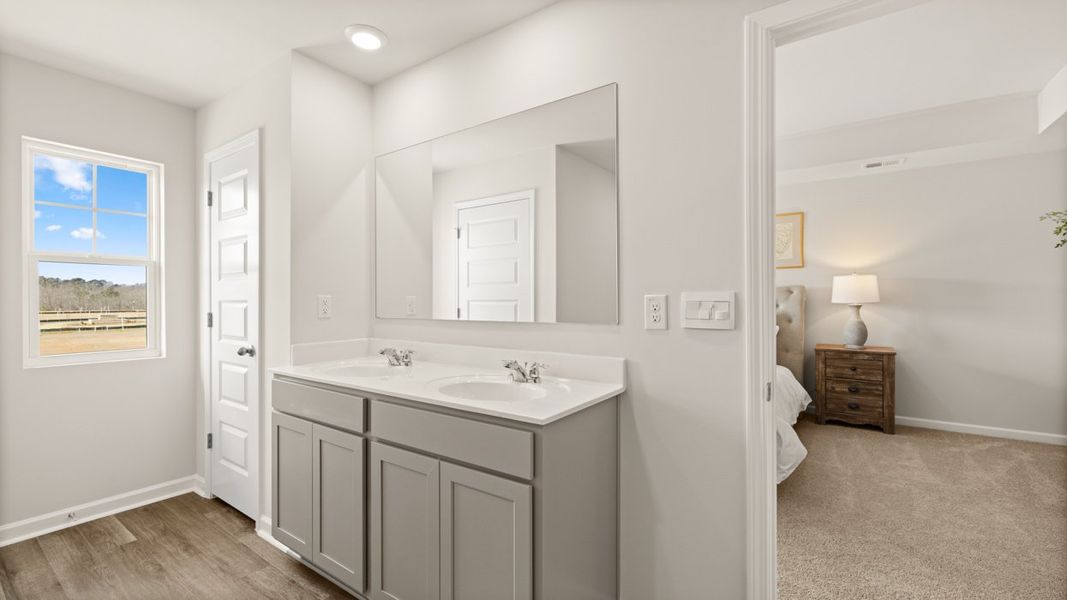 Furnished interior in a model home at The Reserve at North Bridges in McDonough (Image 23).