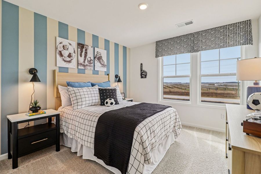 Furnished interior in a model home at Old Charleston Acres in Pelion (Image 12).