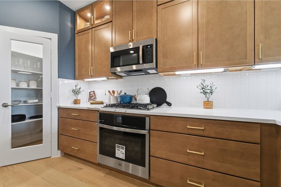 Furnished interior in a model home at Wildrye in Waller (Image 29).