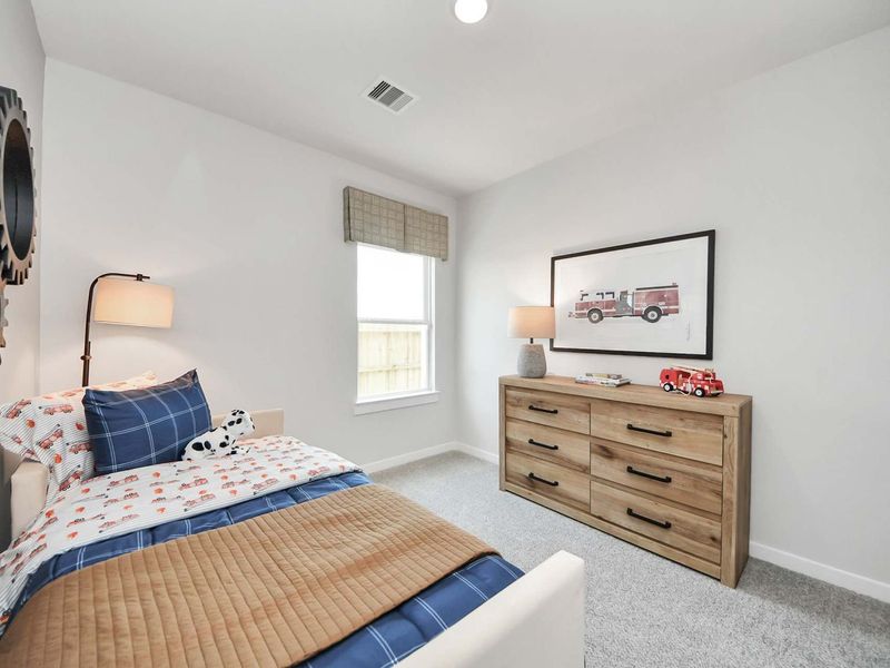 Furnished interior in a model home at Enclave at Newport in Crosby (Image 16).