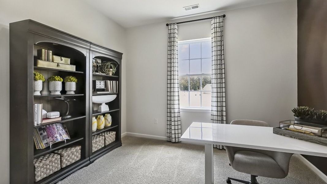 Furnished interior in a model home at The Reserve at Prestleigh in Wake Forest (Image 56).