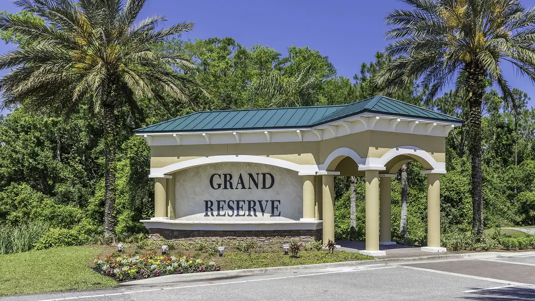 Entrance to the Grand Reserve community in Bunnell, FL, featuring signage and landscaping (Image 1).