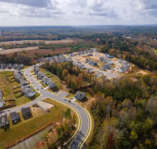 Aerial view of the Neill's Pointe community in Angier, NC, showing layout and nearby surroundings (Image 1).