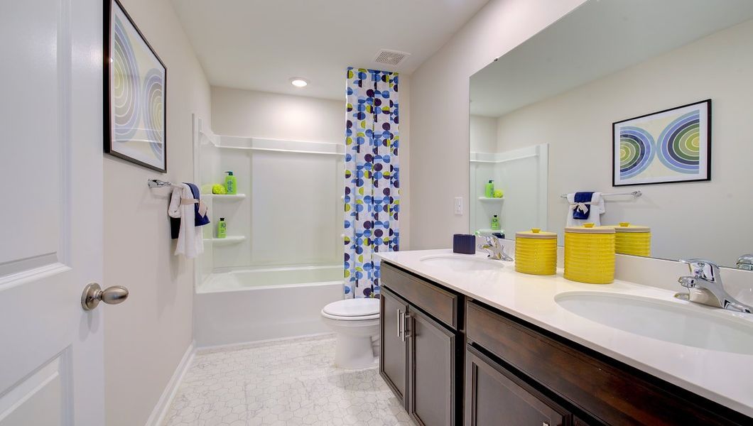 Furnished interior in a model home at Tap Root Farms in Fletcher (Image 26).