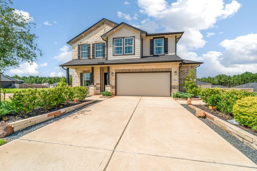 Front exterior of a home in the Magnolia Springs community, located in Montgomery, TX (Image 4).