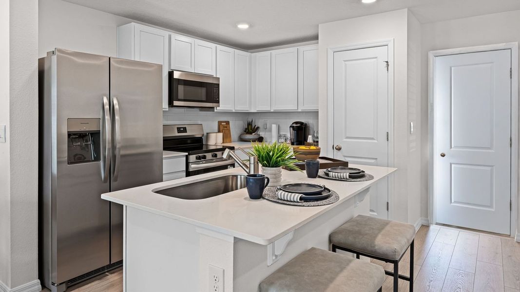 Furnished interior in a model home at Fish Lake Cove in Kissimmee (Image 21).