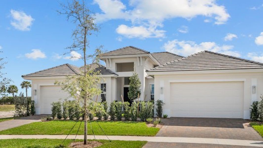 Front exterior of a home in the BELTERRA community, located in Port St. Lucie, FL (Image 63).
