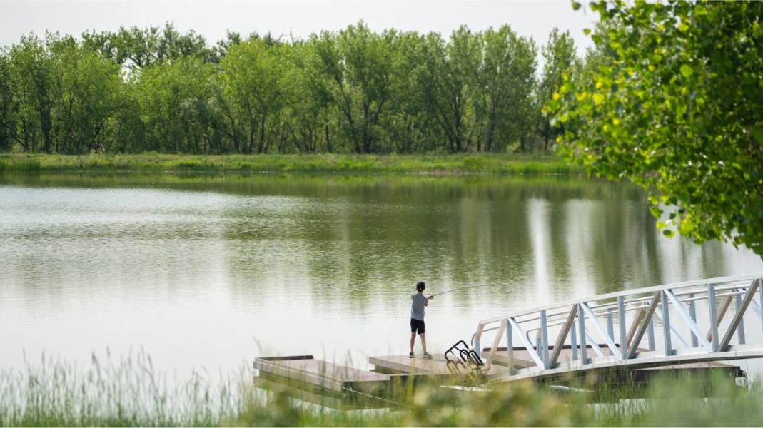 Barefoot Lakes lake amenity boy fishing on lake Barefoot Lakes lake amenity boy fishing on lake