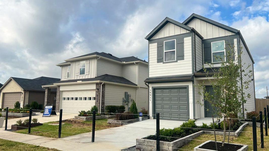 Front exterior of a home in the The Villas at Legacy Park community, located in Houston, TX (Image 2).