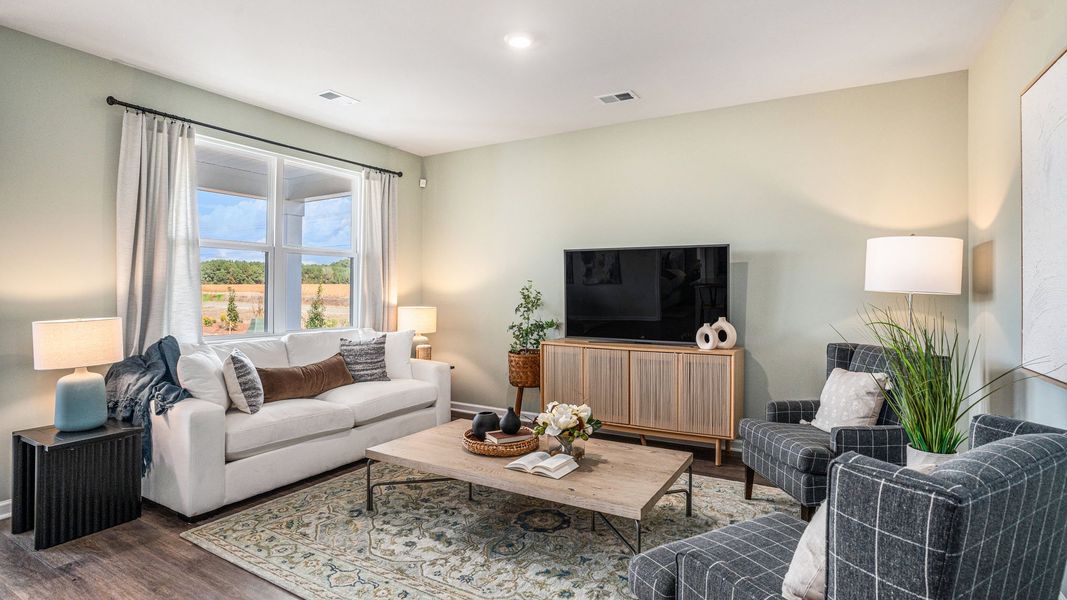 Furnished interior in a model home at Pinewood Estates in Conway (Image 8).
