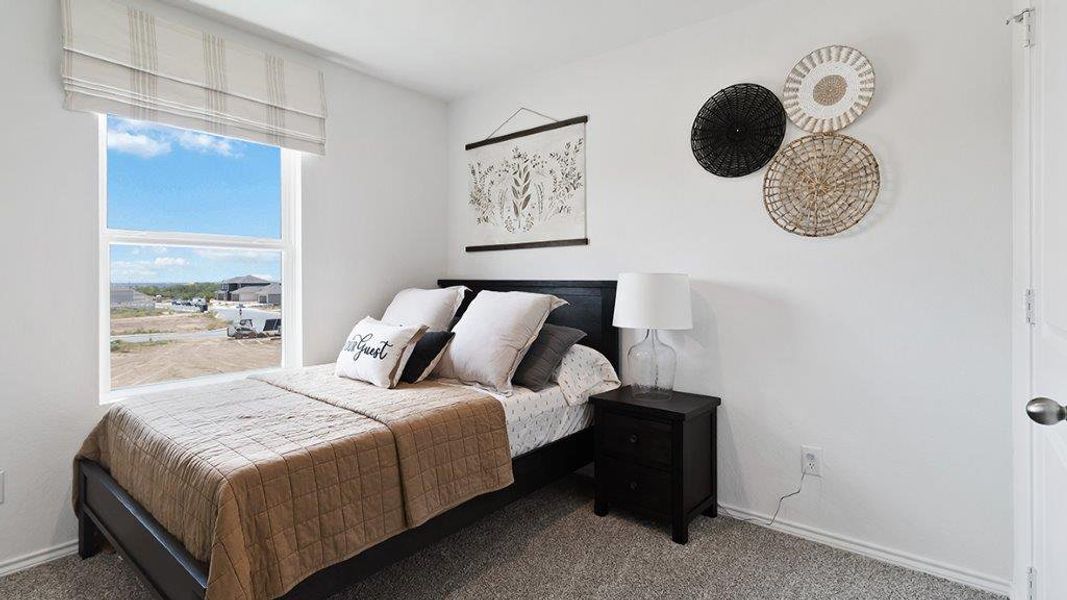 Furnished interior in a model home at Lucero in San Antonio (Image 21).