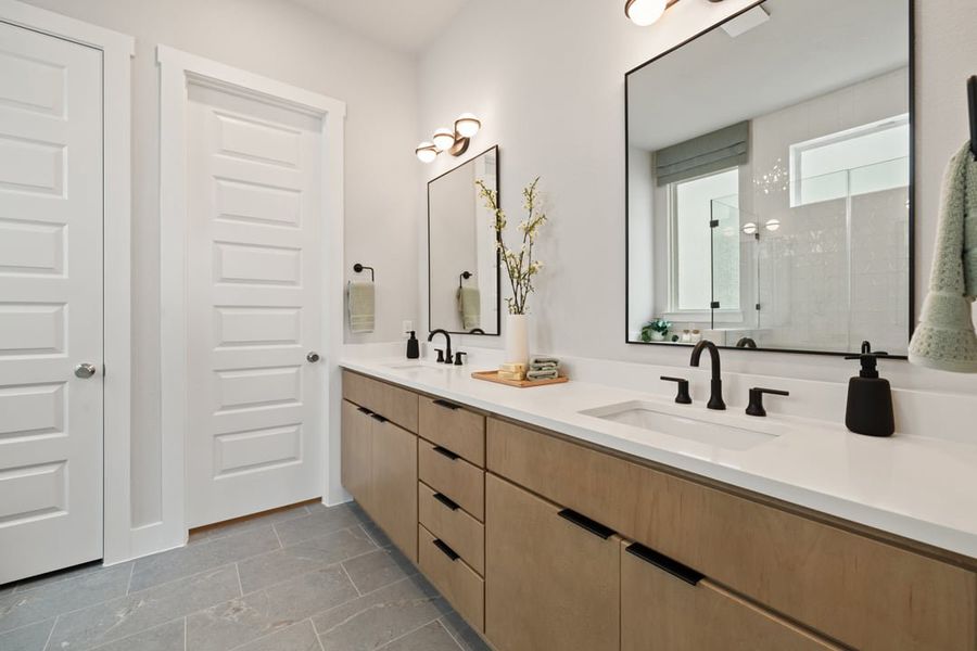 Furnished interior in a model home at Wolf Ranch in Georgetown (Image 9).