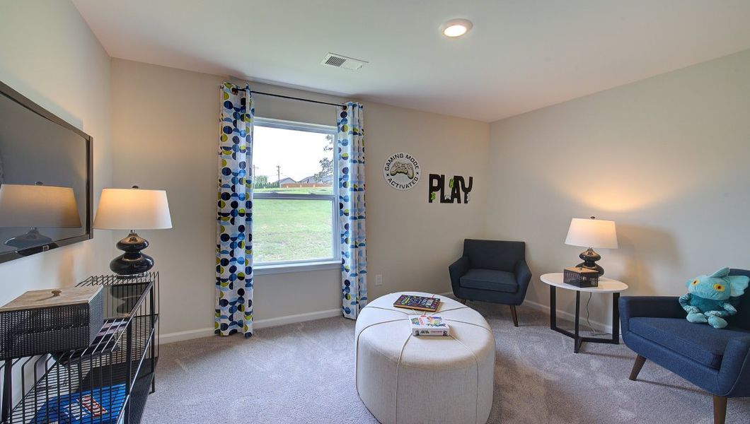 Furnished interior in a model home at Tap Root Farms in Fletcher (Image 29).