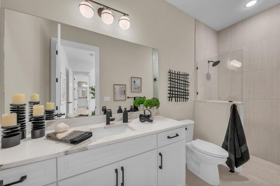 Furnished interior in a model home at Hampton Lakes in Sarasota (Image 168).